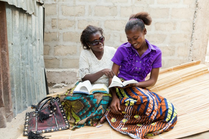 two women study together