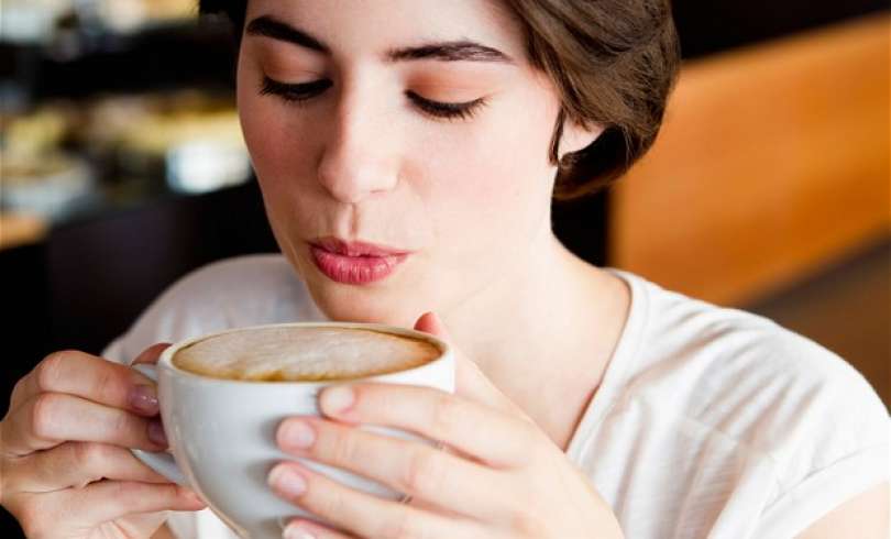 woman drinking coffee