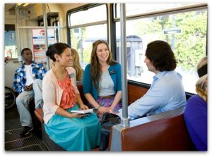 full-time missionaries preparing a member missionary on the way to a lesson.