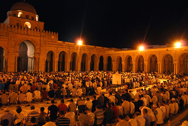 Muslims praying at mosque during month of Ramadan