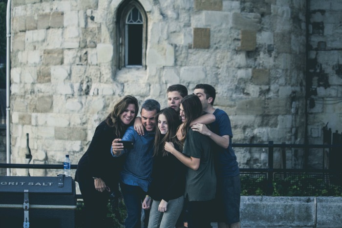 A group of friends takes a picture.