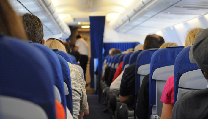 People sitting inside plane