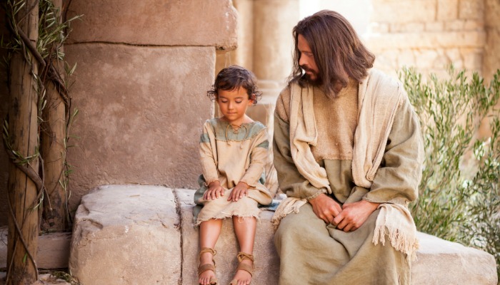 Jesus sitting with a child