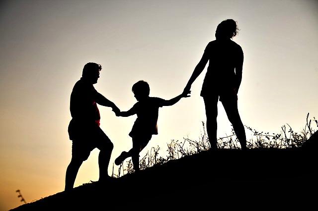 Family with a Kid at sunrise