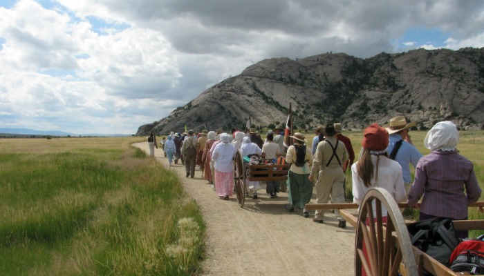 Mormon youth participate in a pioneer trek re-enactment.