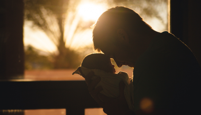 Night shot of dad with baby