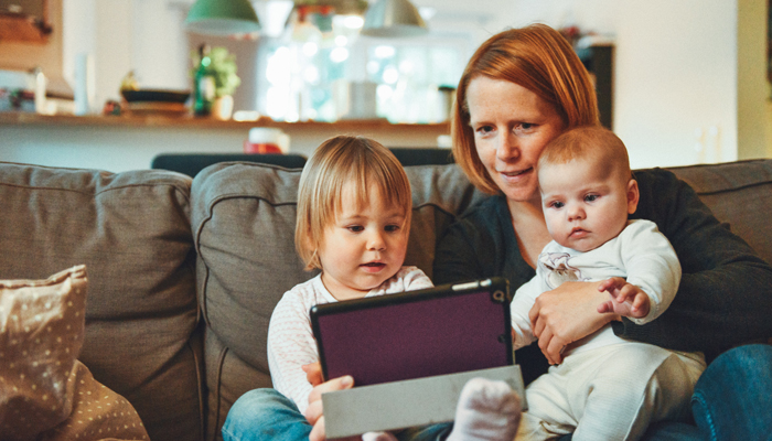 mother reading to children