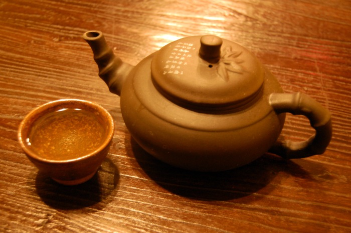 Oriental Tea Pot On Wood