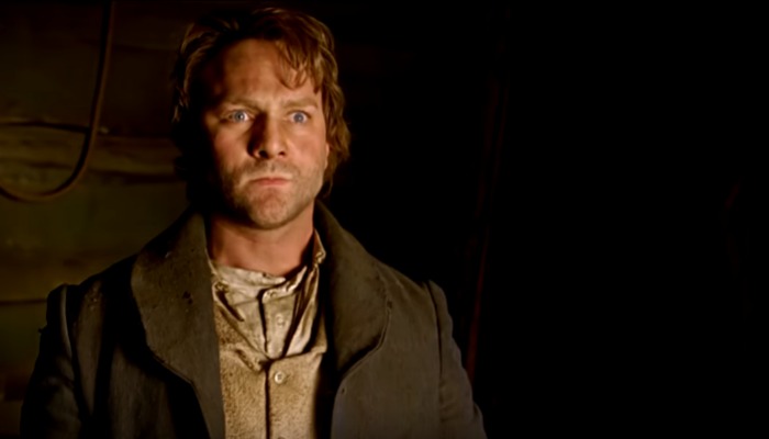 Actor portraying Joseph Smith looking intense.