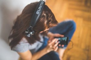 woman listening headphones