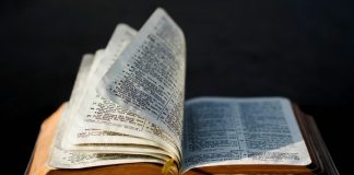 A Bible with pages fluttering