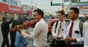 LDS Missionaries playing violin in Mexico