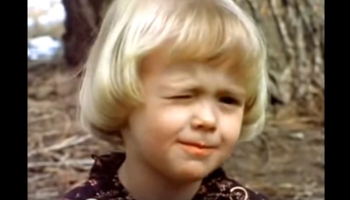 Cute 1980s LDS kid winking