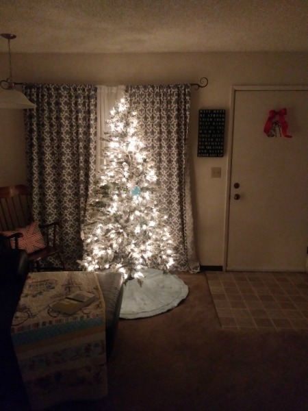 Lit fake Christmas tree