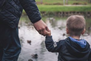 child parent duck pond