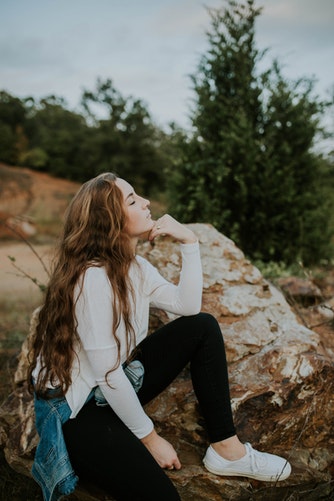 woman relaxes nature