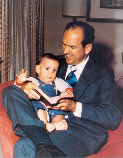 President Russell M. Nelson with his baby son, Russell M. Nelson Jr. on his lap