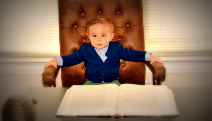 Baby sitting in office chair