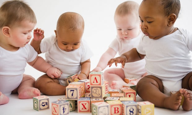 Babies playing with blocks