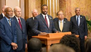 Derrick Johnson making statement with LDS church leaders 