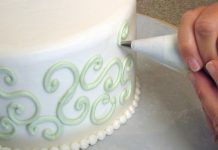 decorating a wedding cake