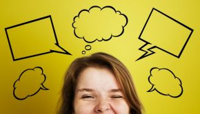 Woman with thought bubbles above her head on yellow background