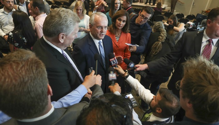 Jack Gerard speaking with media at press conference.