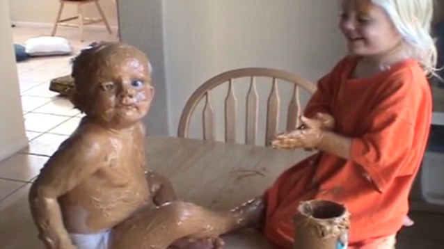 Kids playing in peanut butter.