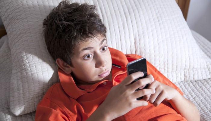 Mormon Apps to protect family from Pornography kid looking at phone