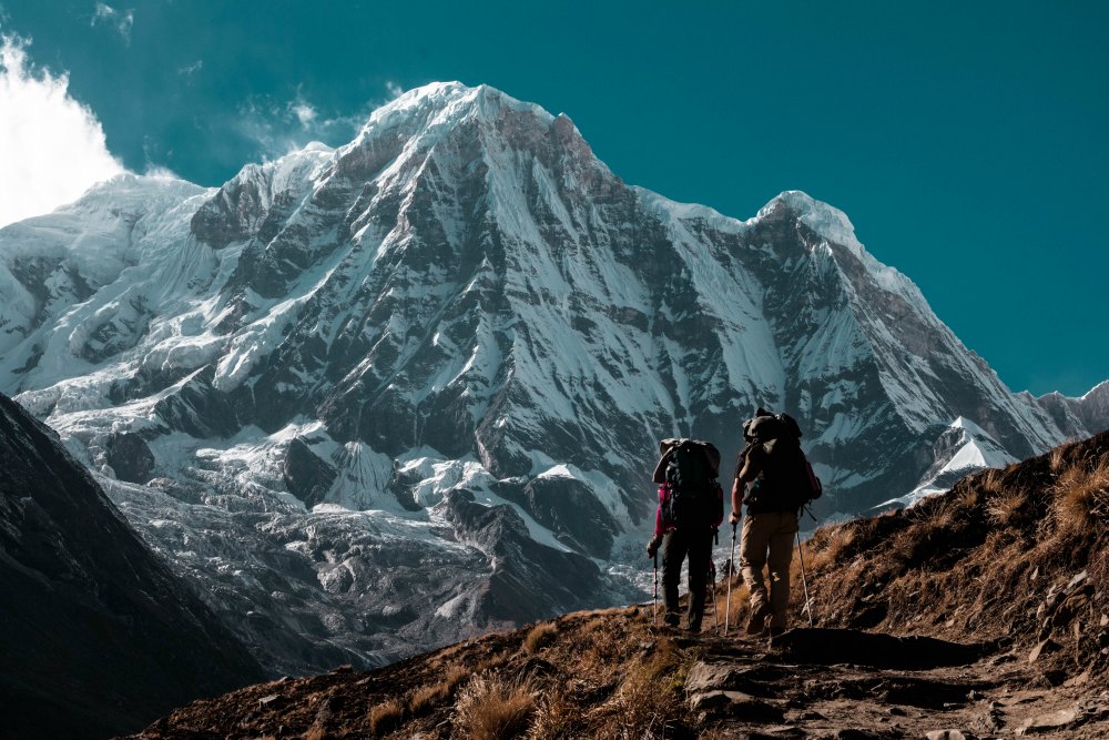 two hikers on a mountain mormon