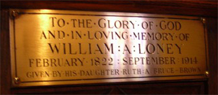 dedicatory plaque on church pew