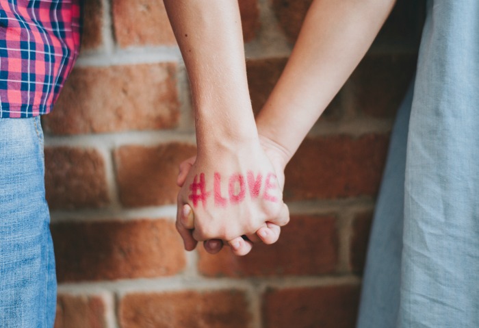 couple holding hands