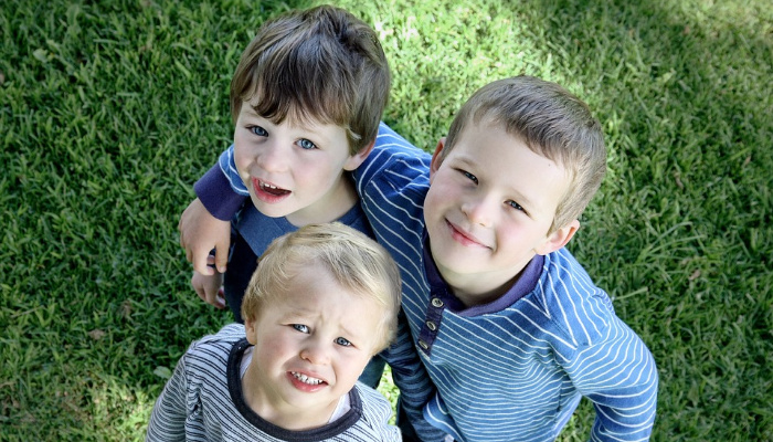 Three Young Brothers in the Grass Smilling | Awesome Siblings in the Scriptures | Famous Siblings in the Bible | Biblical Brothers | Famous Sisters in the Bible | Third Hour