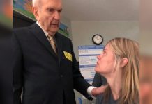 Photo of President Nelson visiting a woman in the hospital.