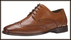 Tan wingtip men's shoe