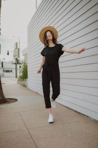 woman walking while wearing jumpsuit