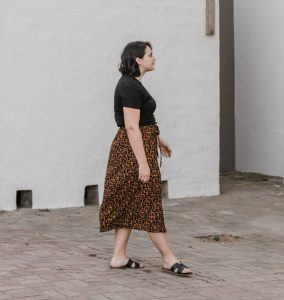 girl in skirt walking