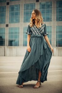 Woman standing in wrap dress