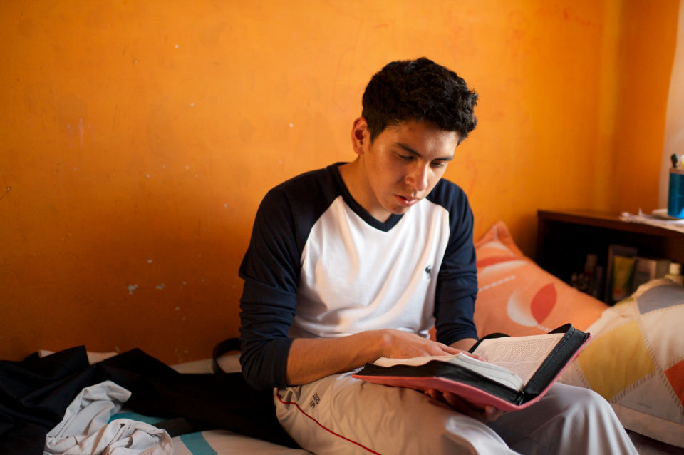 man with scrupulosity studying his scriptures