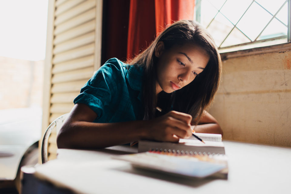 Woman studying the scriptures