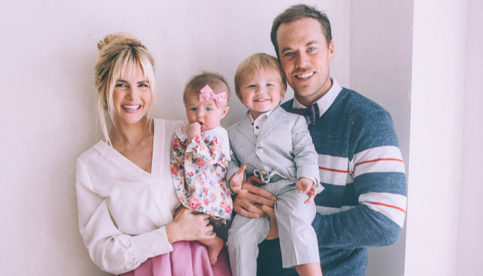 family in their sunday best at home