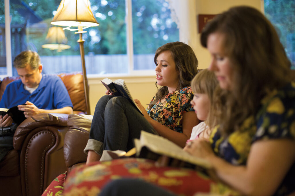 family reading Book of Mormon