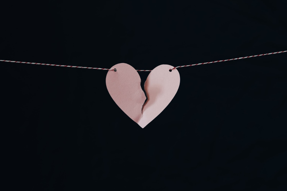 broken heart hanging on a string
