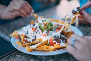 people eating nachos