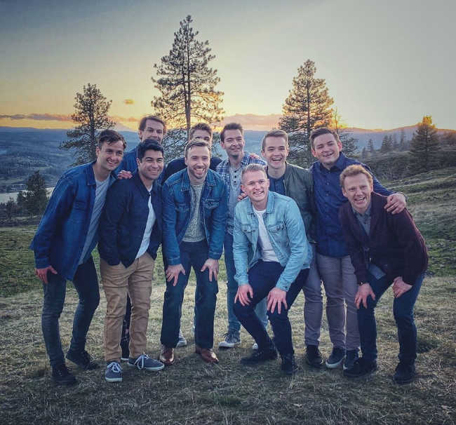 byu vocal point standing with peter hollens smiling