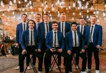 byu vocal point dressed in blue with lights