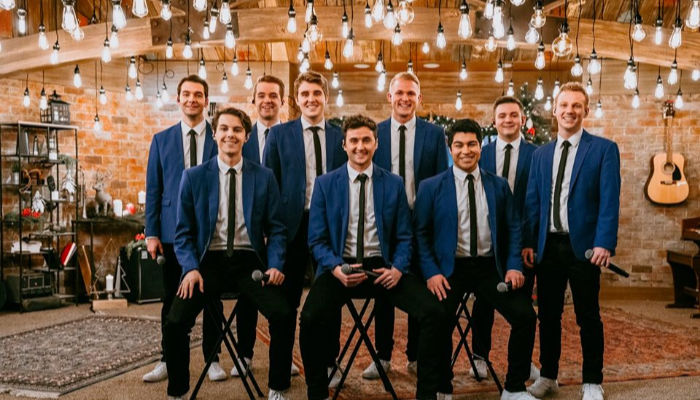 byu vocal point dressed in blue with lights