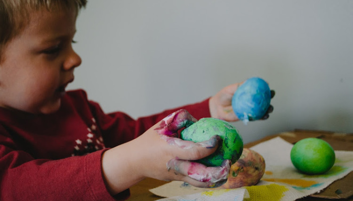 young boy doing quarantine crafts