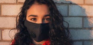 school girl in face mask