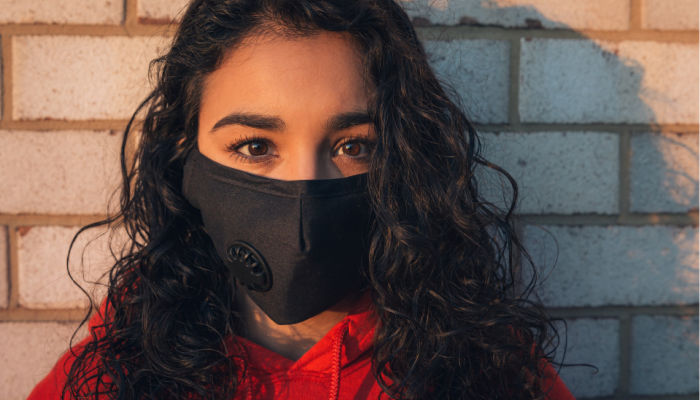 school girl in face mask